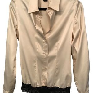 NWOT Victoria’s Secret satin button down shirt with black lace thong.Size S